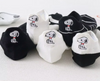 Medias Snoopy Blancas y Negras