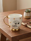 Taza Snoopy Dorada
