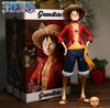 Figura One Piece , Luffy sonriente,  cambia de cara de tres formas, 28cm