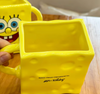 Taza Bob esponja con tapa y Carrizo 3D. y caja de regalo